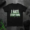 Black t-shirt with white and green "I HATE EVERYTHING" text in a distressed, dripping font
