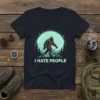 I Hate People Bigfoot t-shirt design with Sasquatch walking in front of a full moon and mountains