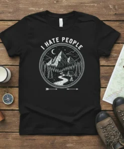 Black t-shirt with "I Hate People" text above a circular graphic of mountains, trees, and a tent under a crescent