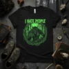 I Hate People T-Shirt with a green werewolf graphic flipping the middle finger, surrounded by thorny vines