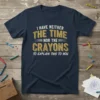 Navy blue t-shirt with white and yellow text saying "I HAVE NEITHER THE TIME NOR THE CRAYONS TO EXPLAIN THIS