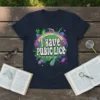 T-shirt with the bold white text "I HAVE PUBIC LICE" surrounded by colorful, psychedelic graphics of bugs and DNA strands
