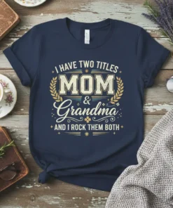I Have Two Titles Mom & Grandma AND I ROCK THEM BOTH quote on a navy t-shirt with laurel wreath
