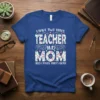 T-shirt with text "I HAVE TWO TITLES TEACHER AND MOM AND I ROCK THEM BOTH" in floral and block lettering