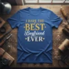 I Have The Best Boyfriend Ever text design with gold and white lettering on a blue t-shirt