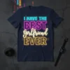 I Have The Best Girlfriend Ever text design with neon-style lettering in turquoise, pink, and yellow on a navy t-shirt