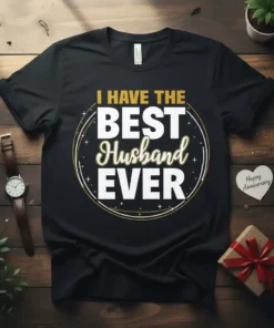 Black t-shirt with "I Have The Best Husband Ever" text in white and gold, featuring a circular design and stars