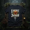 I Heart Jesus t-shirt design with flaming heart and cross graphic, in white and gold lettering