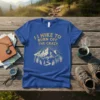 Blue t-shirt with "I Hike To Burn Off The Crazy" text and mountain landscape graphic