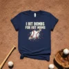 I HIT BOMBS FOR HOT MOMS text with a graphic of a baseball exploding outwards on a navy t-shirt