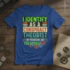 I Identify As A Conspiracy Theorist quote tee with bold typography and gear graphics. Pronouns are Told/You/So