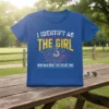 T-shirt with text "I IDENTIFY AS THE GIRL WHO WAS RIGHT THE ENTIRE TIME" in bold yellow and white font