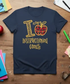 Navy blue t-shirt with "I is for Instructional Coach" text and an apple graphic. Features leopard print "I" and plaid