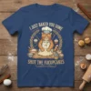 I JUST BAKED YOU SOME SHUT THE FUCUPCAKES t-shirt design featuring a cat chef kneading dough surrounded by cupcakes and