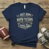 I Just Hope Both Teams Have Fun text design on a navy blue t-shirt with graphic elements like whistles and