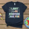 I JUST Hope EVERYONE HAS FUN quote on a navy t-shirt with colorful pastel text and balloon graphics