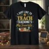 I Just Like To Teach Teaching's My Favorite quote on a black t-shirt with festive holiday and school-themed graphics