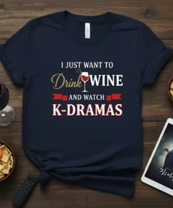 I JUST WANT TO Drink WINE AND WATCH K-DRAMAS text design with a wine glass graphic on a navy t-shirt