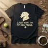 Black t-shirt with "I Just Want To My Dog Proud" text and golden retriever graphic, featuring a paw print
