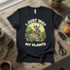 Black t-shirt with "I Just Wet My Plants" text and a cartoon skeleton watering plants in pots