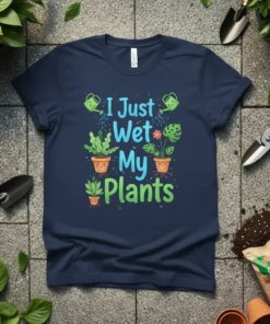 T-shirt with "I Just Wet My Plants" text and cute potted plants graphics, featuring watering cans and green leaves