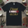 I kissed A NURSE text design featuring eye-catching typography on quality t-shirt