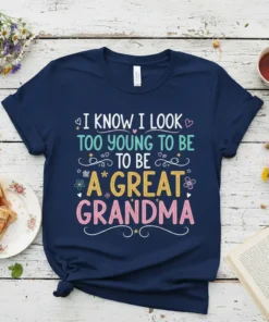 T-shirt with text "I Know I Look Too Young To Be A Great Grandma" in colorful, playful font with floral