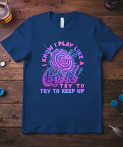 T-shirt with neon pink and blue text "I Know I Play Like A Girl Try To Try To Keep Up"