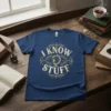 Navy blue t-shirt with "I Know Stuff" text and a vintage globe graphic in gold distressed lettering