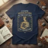Navy t-shirt with gold text "I Leave Homework To The Last Day And Theirefore" and an owl on books design