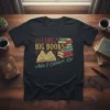I Like Big Books And I Cannot Lie quote on a black t-shirt with stack of books graphic