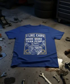 Blue t-shirt with white text "I Like Cars More More Than People" and a detailed engine graphic, for car enthusiasts