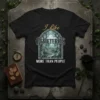 I Like Cemeteries MORE THAN PEOPLE t-shirt featuring a gothic graveyard scene with tombstones and trees
