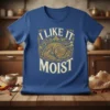 I Like It Moist Thanksgiving turkey design with ornate golden scrollwork on a royal blue t-shirt