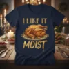 I Like It Moist text with a golden roasted turkey graphic on a navy blue t-shirt design