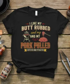 Black t-shirt with the text "I Like My Butt Rubbed and My Pork Pulled Certified BBQ Pitmaster" in vintage style