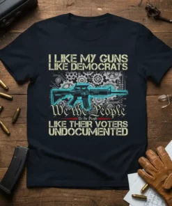 Political statement t-shirt with text "I Like My Guns Like Democrats We the People Like Their Voters Undocumented" and an