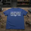 Blue t-shirt with white text "I LIKE THINGS THAT GO PEW PEW" and a graphic of a rifle