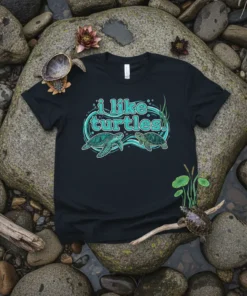 Black t-shirt with "i like turtles." text and two sea turtles swimming in a turquoise wavy circle graphic