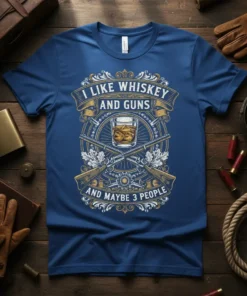 T-shirt with the text "I Like Whiskey And Guns And Maybe 3 People" featuring crossed shotguns and a glass of