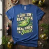 I Like 'Em Real Thick Real Thick & Juicy pickle quote t-shirt design with a smiling cartoon pickle graphic