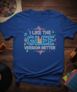T-shirt with "I LIKE THE GLEE VERSION BETTER" text in neon-style font, featuring musical notes and sound waves