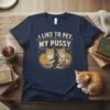 I Like To Pet My Pussy text with two cute orange tabby cats illustration on a navy blue t-shirt