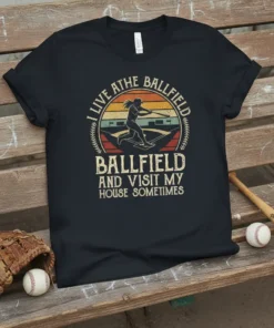 T-shirt with text "I Live At The Ballfield Ballfield And Visit My House Sometimes" and baseball player graphic