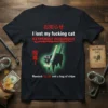 Black t-shirt with red Japanese text and "I lost my fucking cat EXTREMELY POISONOUS" in white and red. Features a