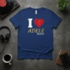 I Love Adele Music t-shirt with white "I", red geometric heart, and gold glitter text "ADELE MUSIC"