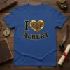 I Love Albert t-shirt design with a black 'I', a decorative gold heart with red gems, and black 'Albert' text
