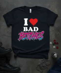 Black t-shirt with "I Love Bad Bitches" text and red heart graphic, featuring bold pink and blue lettering