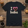 Navy t-shirt with "I Love Boba" text and a pink heart filled with tapioca pearls, the primary keyword is I