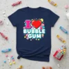 I love bubble gum text with a red heart and colorful candy graphics on a navy t-shirt